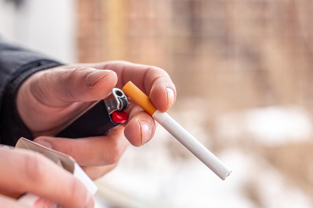 Male hands holding cigarette lighter smoking concept 169016 67049